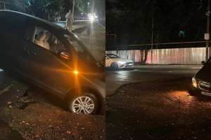 Алматыда нөсер жауын салдарынан жол опырылып, 13 көлікке зақым келген