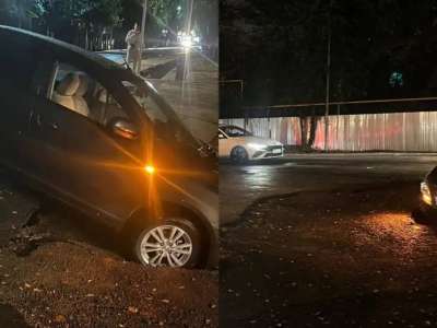 Алматыда нөсер жауын салдарынан жол опырылып, 13 көлікке зақым келген