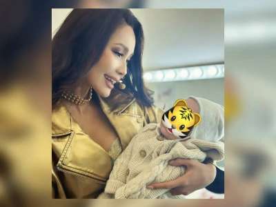 «Баласы ма, күйеуге шығып па еді?»: Оқырмандар Жанар Дұғалованың сәби құшақтаған суретін талқылады